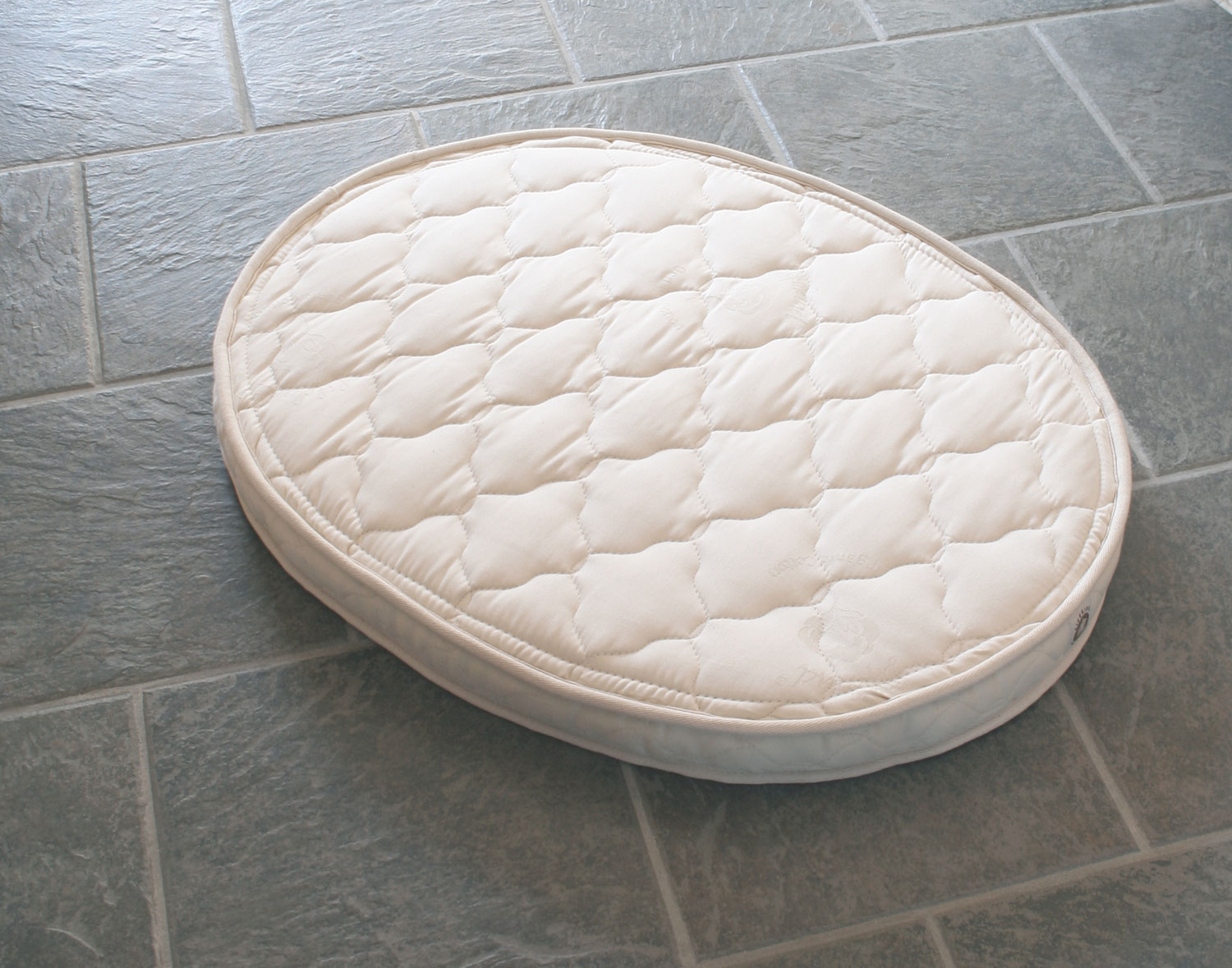 firm oval bassinet mattress