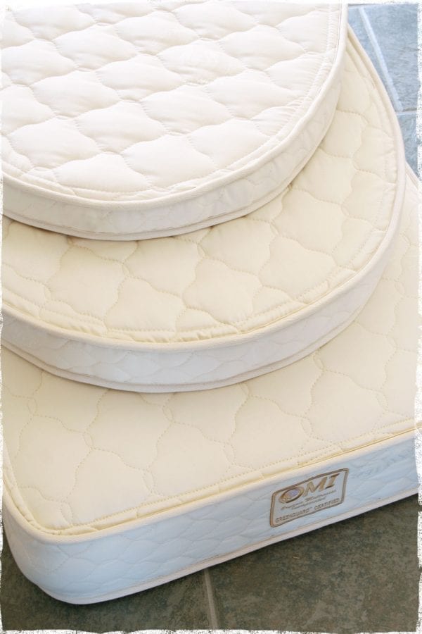 OMI-natural-rubber-oval-crib-mattress-sleepworksny.com