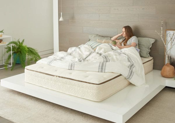 naturepedic-Halcyon-Azure-organic-mattress with woman