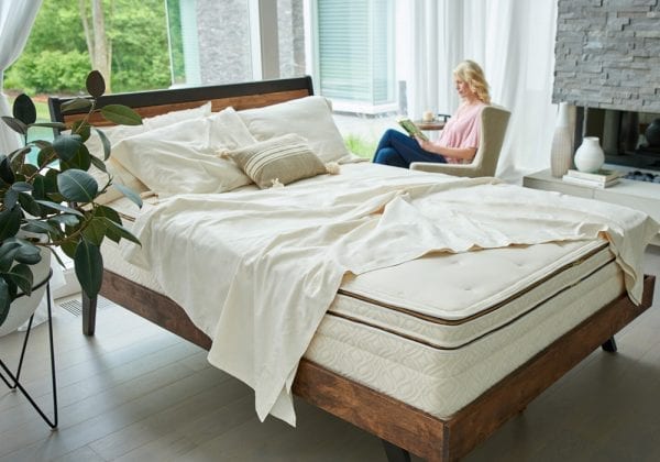 Halcyon Arcadia mattress in room with woman reading