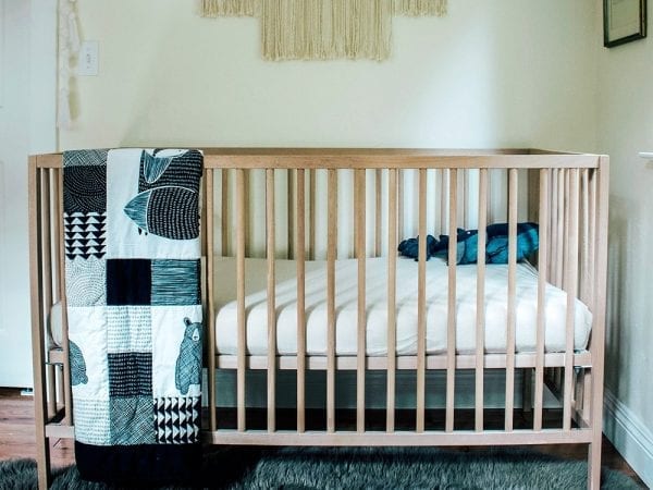 crib in baby nursury