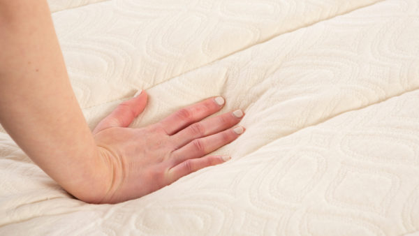 ghostbed natural latex mattress hand